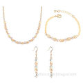 Elegant jewelry set with rhinestones, necklace, bracelet and earrings, available in various designs